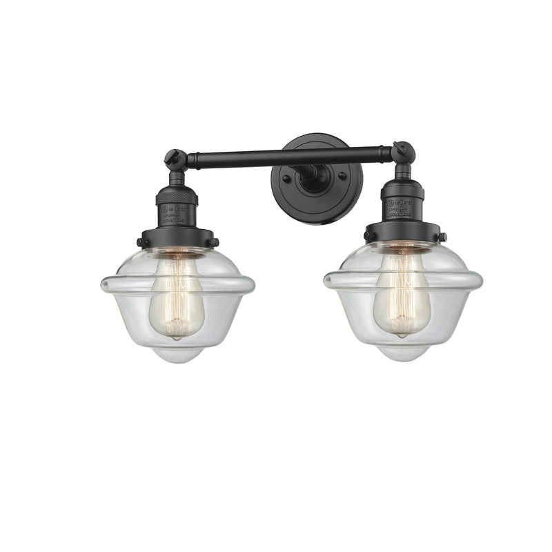 Oxford Bath Vanity Light shown in the Oil Rubbed Bronze finish with a Clear shade