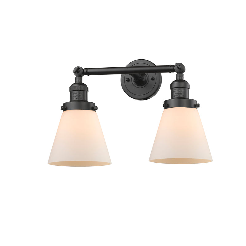 Cone Bath Vanity Light shown in the Oil Rubbed Bronze finish with a Matte White shade