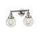 Beacon Bath Vanity Light shown in the Polished Nickel finish with a Clear shade