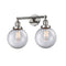 Beacon Bath Vanity Light shown in the Polished Nickel finish with a Clear shade