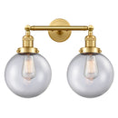 Beacon Bath Vanity Light shown in the Satin Gold finish with a Clear shade