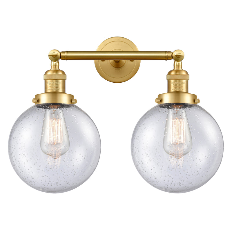 Beacon Bath Vanity Light shown in the Satin Gold finish with a Seedy shade