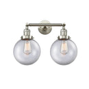 Beacon Bath Vanity Light shown in the Brushed Satin Nickel finish with a Clear shade