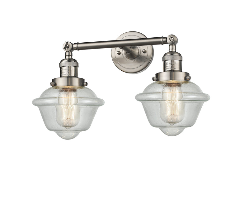 Innovations Lighting Small Oxford 2-100 watt 17 inch Brushed Satin Nickel Bathroom Fixture with Seedy glass and Solid Brass 180 Degree Adjustable Swivels 208SNG534