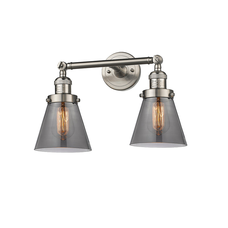 Cone Bath Vanity Light shown in the Brushed Satin Nickel finish with a Plated Smoke shade