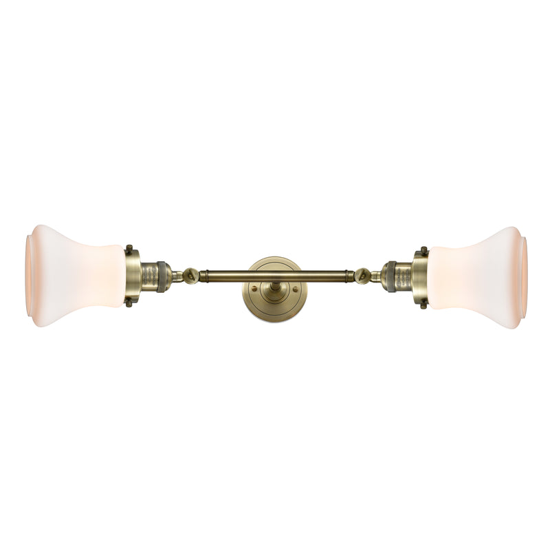 Bellmont Bath Vanity Light shown in the Antique Brass finish with a Matte White shade