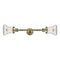 Bellmont Bath Vanity Light shown in the Antique Brass finish with a Clear shade