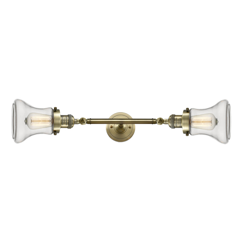 Bellmont Bath Vanity Light shown in the Antique Brass finish with a Clear shade