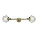 Oxford Bath Vanity Light shown in the Antique Brass finish with a Seedy shade