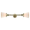 Cone Bath Vanity Light shown in the Antique Brass finish with a Matte White shade