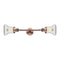 Bellmont Bath Vanity Light shown in the Antique Copper finish with a Clear shade