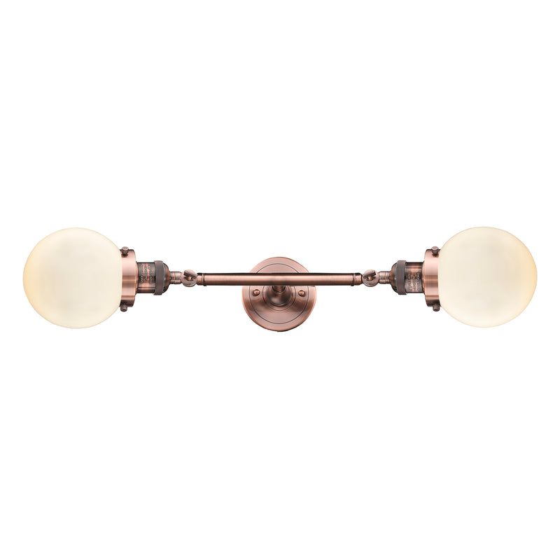 Beacon Bath Vanity Light shown in the Antique Copper finish with a Matte White shade