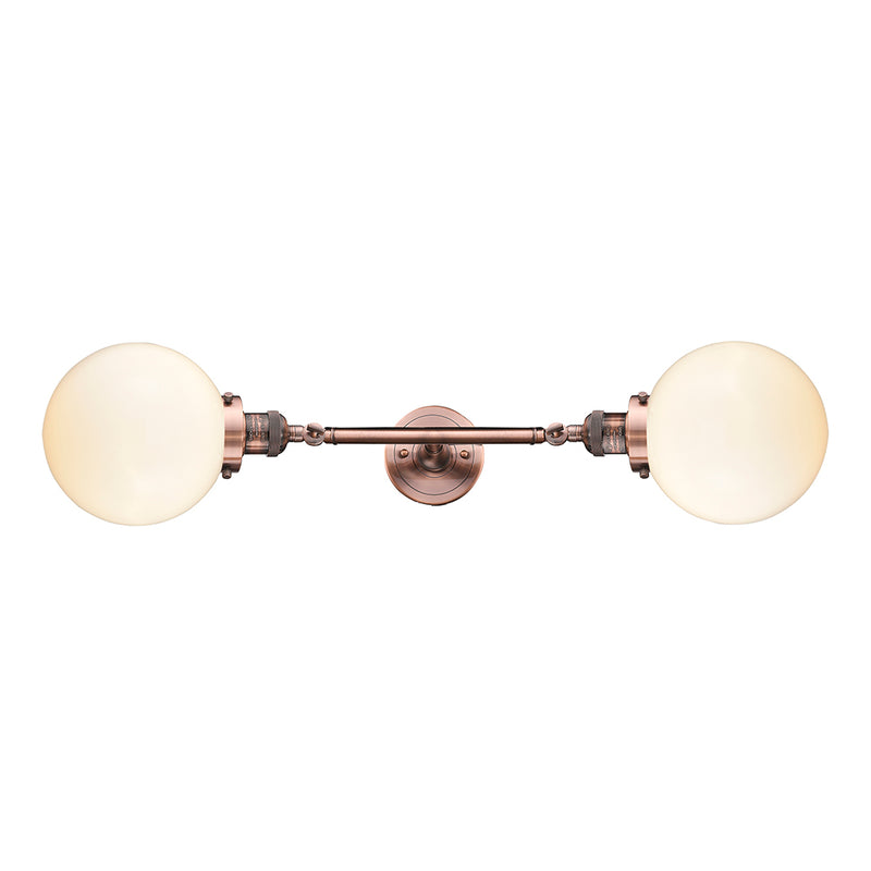 Beacon Bath Vanity Light shown in the Antique Copper finish with a Matte White shade