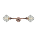 Oxford Bath Vanity Light shown in the Antique Copper finish with a Seedy shade