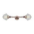 Oxford Bath Vanity Light shown in the Antique Copper finish with a Seedy shade