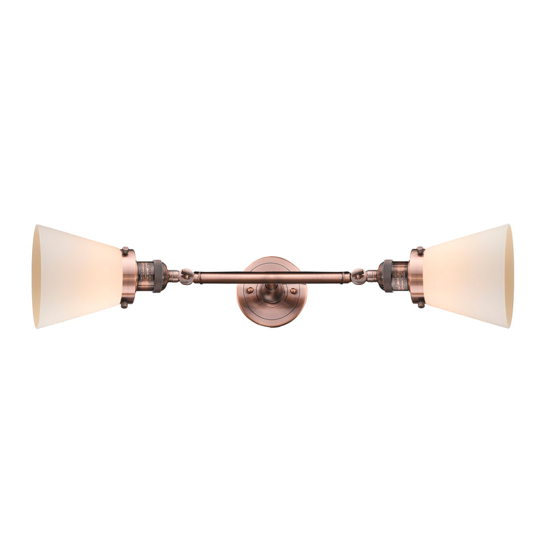 Cone Bath Vanity Light shown in the Antique Copper finish with a Matte White shade