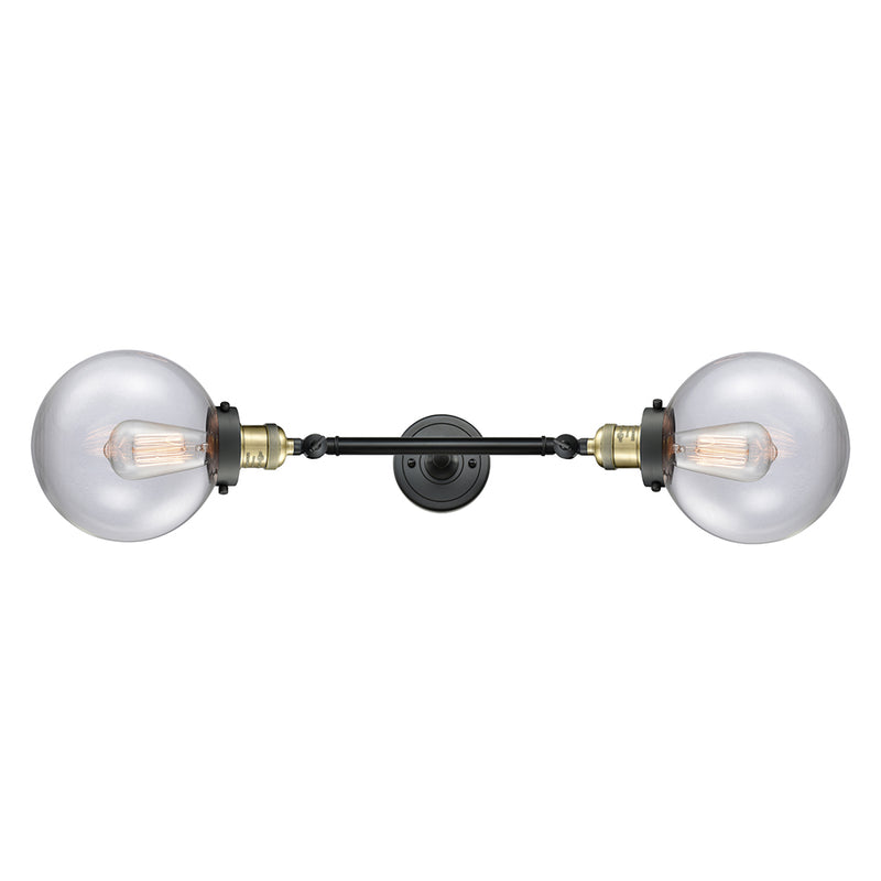 Beacon Bath Vanity Light shown in the Black Antique Brass finish with a Clear shade