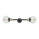 Beacon Bath Vanity Light shown in the Black Antique Brass finish with a Seedy shade