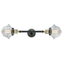 Oxford Bath Vanity Light shown in the Black Antique Brass finish with a Clear shade