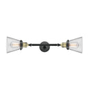 Cone Bath Vanity Light shown in the Black Antique Brass finish with a Clear shade