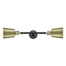 Addison Bath Vanity Light shown in the Black Antique Brass finish with a Antique Brass shade