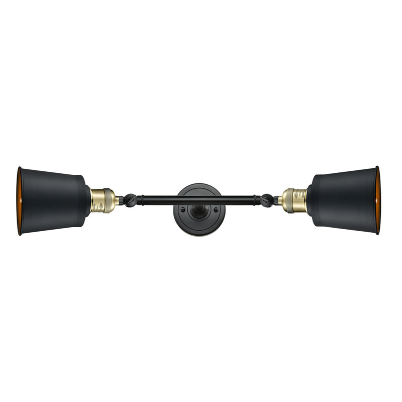 Addison Bath Vanity Light shown in the Black Antique Brass finish with a Matte Black shade