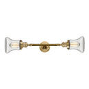 Bellmont Bath Vanity Light shown in the Brushed Brass finish with a Clear shade