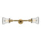 Bellmont Bath Vanity Light shown in the Brushed Brass finish with a Clear shade