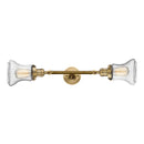 Bellmont Bath Vanity Light shown in the Brushed Brass finish with a Seedy shade