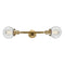 Beacon Bath Vanity Light shown in the Brushed Brass finish with a Clear shade