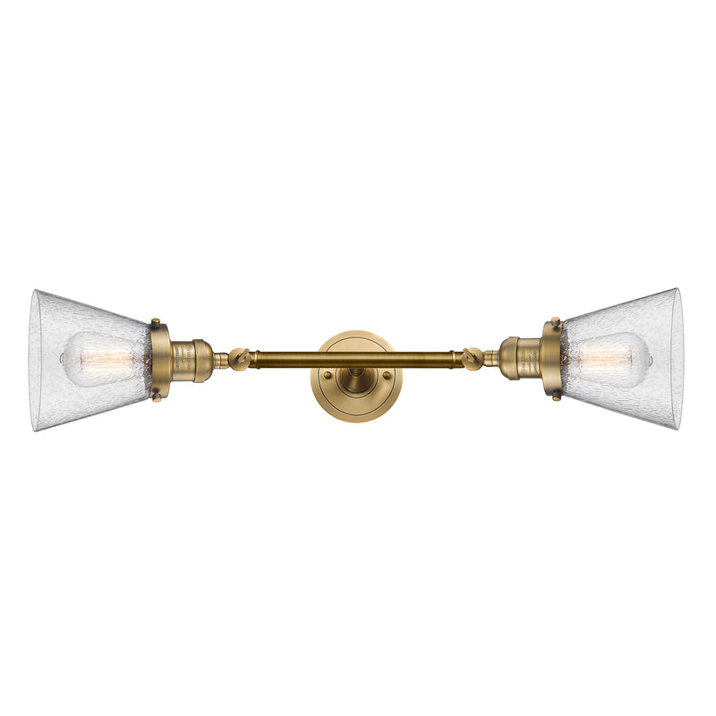 Cone Bath Vanity Light shown in the Brushed Brass finish with a Seedy shade