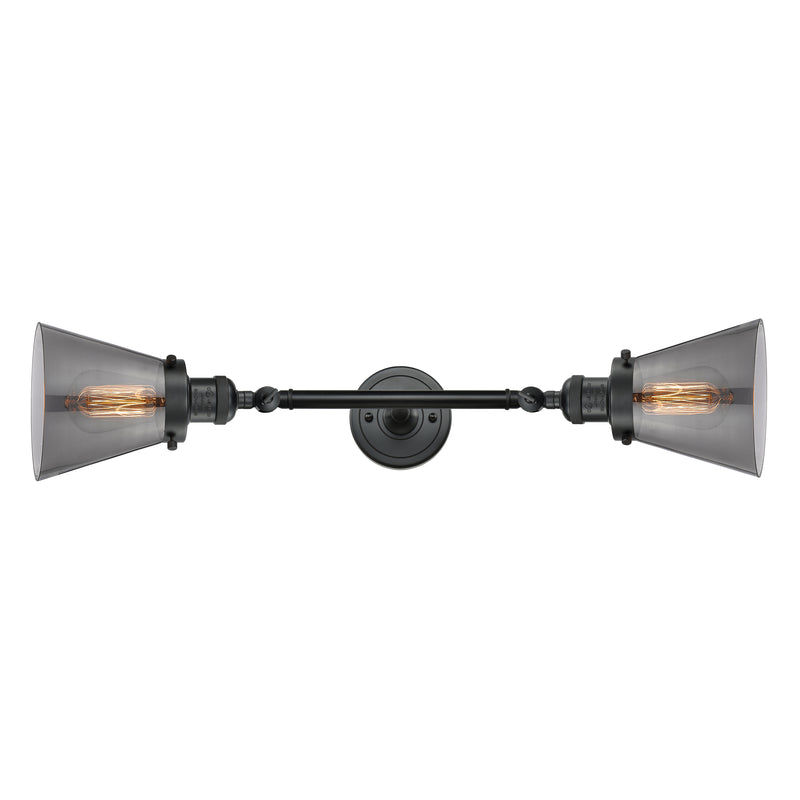 Cone Bath Vanity Light shown in the Matte Black finish with a Plated Smoke shade