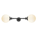 Beacon Bath Vanity Light shown in the Oil Rubbed Bronze finish with a Matte White shade