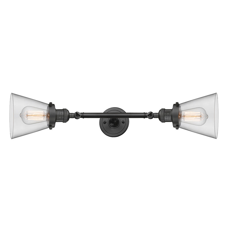 Cone Bath Vanity Light shown in the Oil Rubbed Bronze finish with a Clear shade