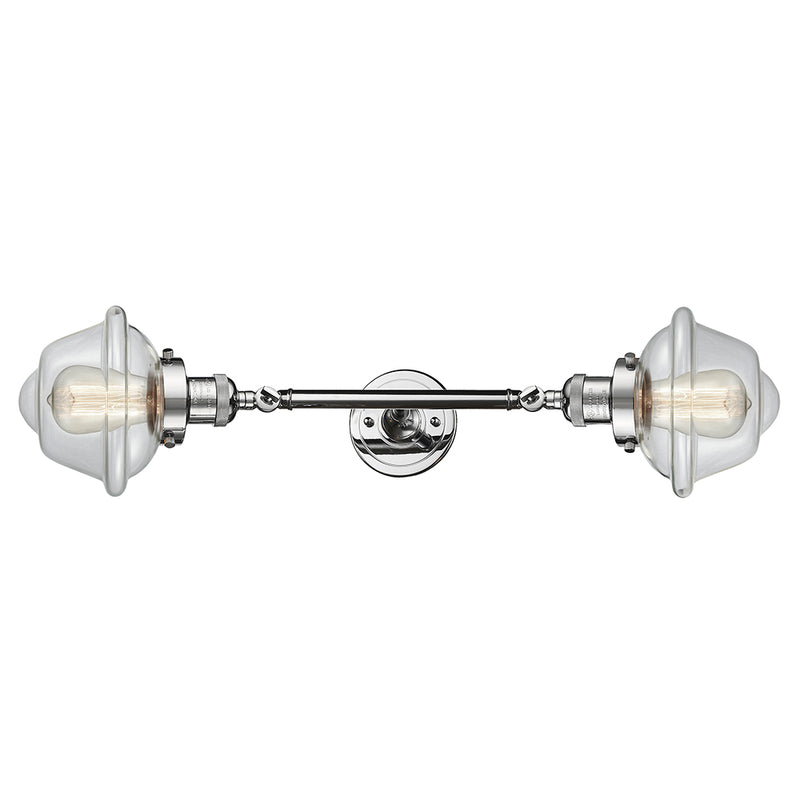 Oxford Bath Vanity Light shown in the Polished Chrome finish with a Clear shade