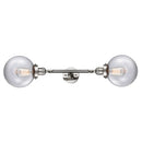 Beacon Bath Vanity Light shown in the Polished Nickel finish with a Clear shade