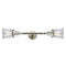 Canton Bath Vanity Light shown in the Brushed Satin Nickel finish with a Clear shade