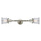 Canton Bath Vanity Light shown in the Brushed Satin Nickel finish with a Clear shade