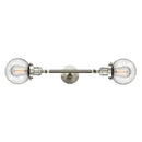 Beacon Bath Vanity Light shown in the Brushed Satin Nickel finish with a Seedy shade