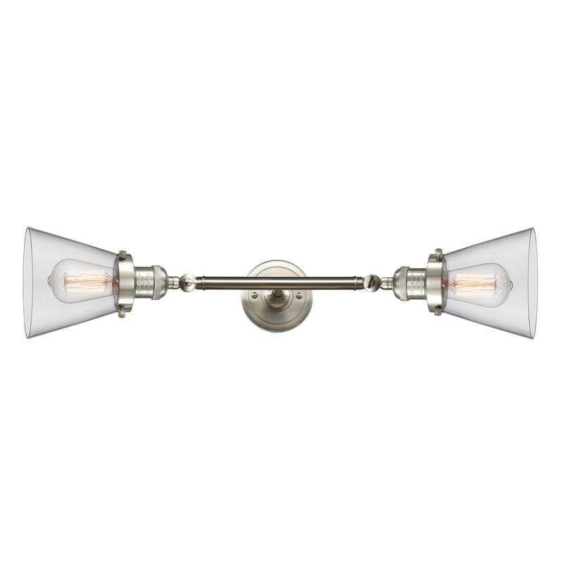 Cone Bath Vanity Light shown in the Brushed Satin Nickel finish with a Clear shade