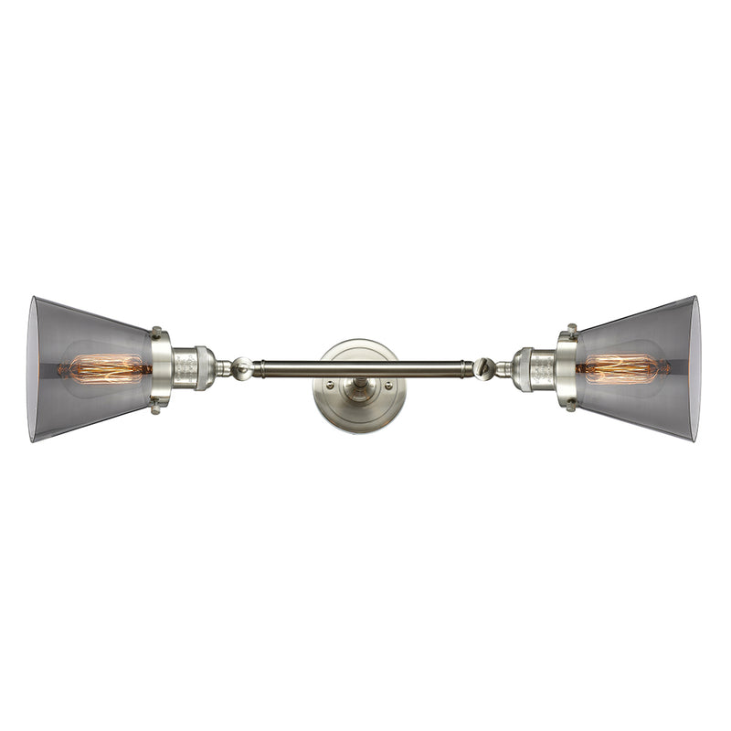 Cone Bath Vanity Light shown in the Brushed Satin Nickel finish with a Plated Smoke shade