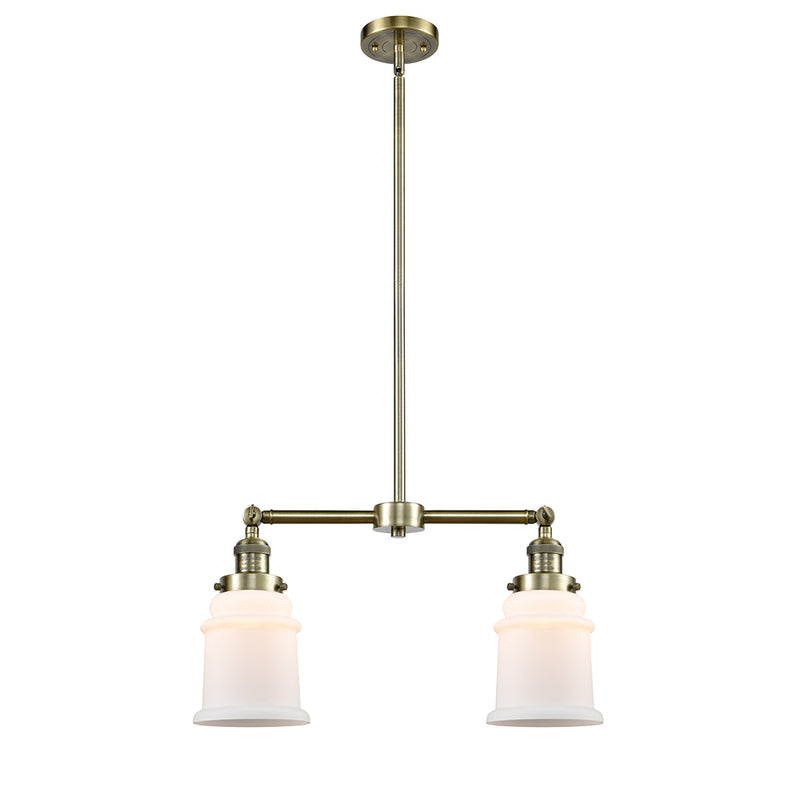 Canton Island Light shown in the Antique Brass finish with a Matte White shade