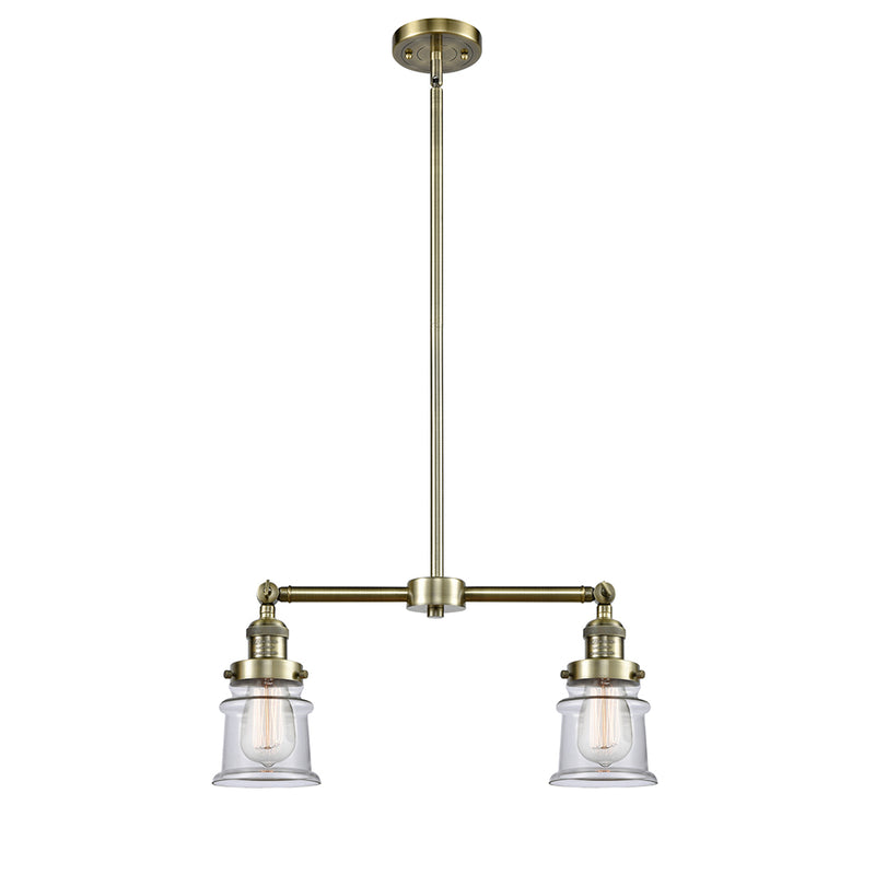 Canton Island Light shown in the Antique Brass finish with a Clear shade