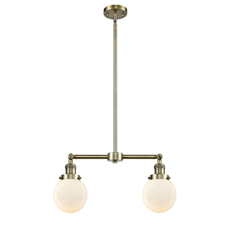 Beacon Island Light shown in the Antique Brass finish with a Matte White shade