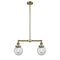 Beacon Island Light shown in the Antique Brass finish with a Seedy shade