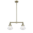 Olean Island Light shown in the Antique Brass finish with a Seedy shade