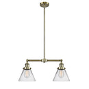 Cone Island Light shown in the Antique Brass finish with a Clear shade