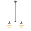 Oxford Island Light shown in the Antique Brass finish with a Matte White shade