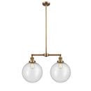 Beacon Island Light shown in the Brushed Brass finish with a Seedy shade