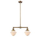 Oxford Island Light shown in the Brushed Brass finish with a Matte White shade